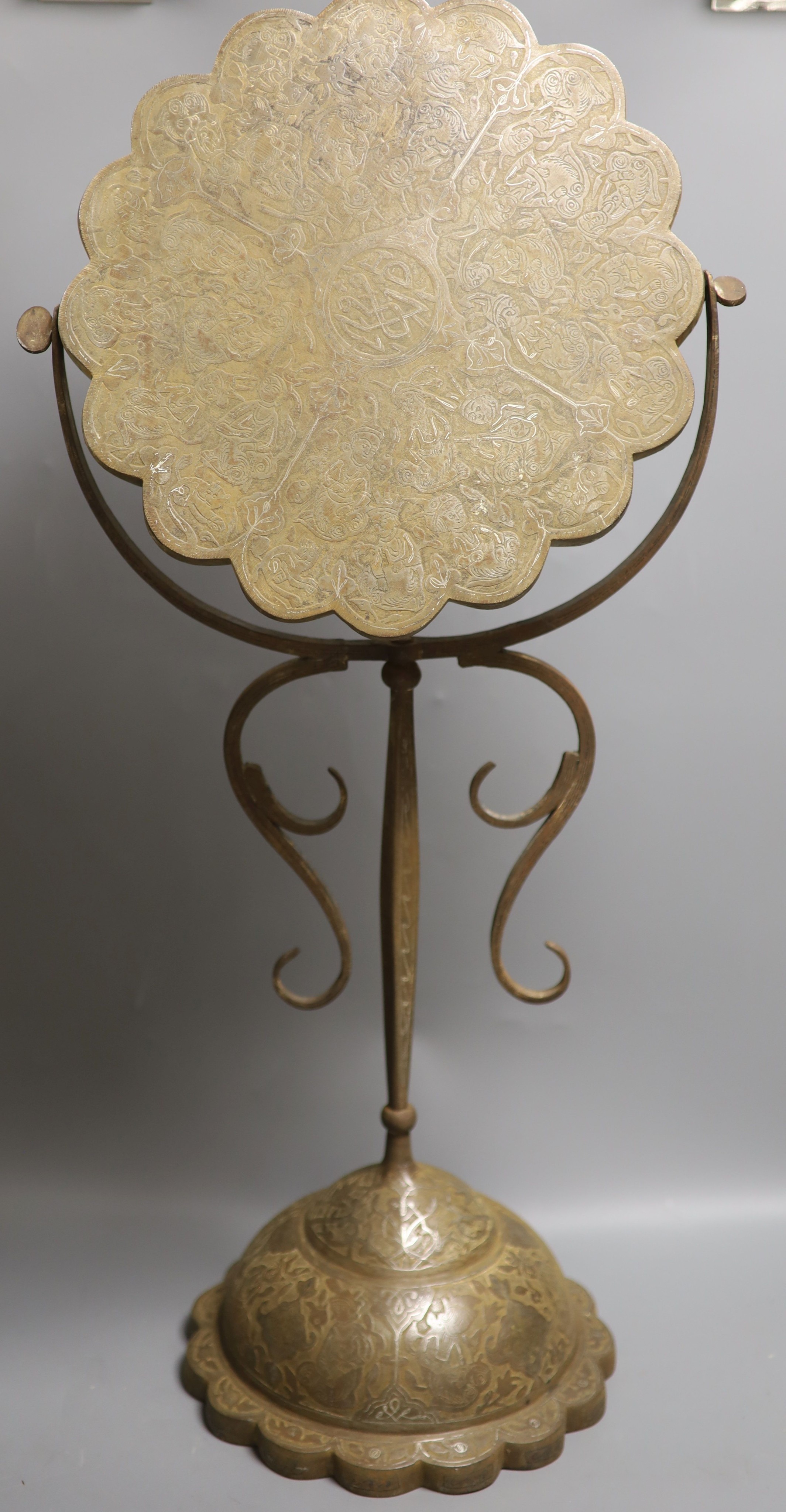 A Persian silver and gilt damascened iron vanity stand, early 20th century 71.5 cm high, lacking mirror